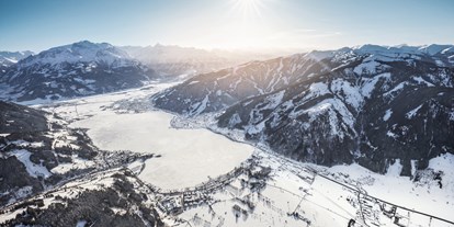 Hotels an der Piste - Verpflegung: Frühstück - Gletscherskigebiet Kitzsteinhorn - Blick auf Zell am See mit dem Zeller See und Umgebung - Hotel Sonnblick
