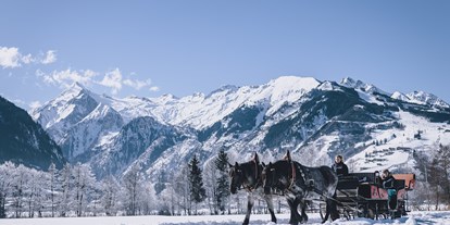 Hotels an der Piste - geführte Skitouren - Pferdeschlittenfahrt durch die verschheite Alpenlandschaft - Hotel Sonnblick