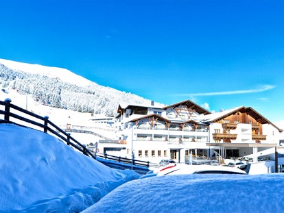 Hotels an der Piste - Skikurs direkt beim Hotel: eigene Skischule - Samnaun Dorf - Hotel Garni s'Röck