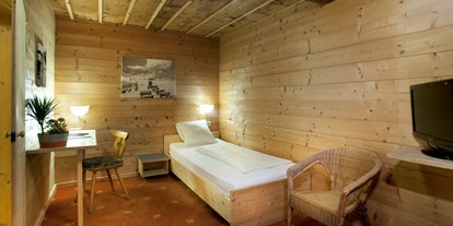 Hotels an der Piste - Parkplatz: kostenlos beim Hotel - Tirol - Einzelzimmer Almhütte - SCOL Sporthotel Großglockner