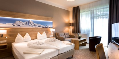 Hotels an der Piste - Pools: Innenpool - Skigebiet Grossglockner Resort Kals-Matrei - Doppelzimmer im Figol I - SCOL Sporthotel Großglockner