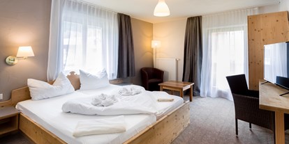 Hotels an der Piste - Parkplatz: kostenlos beim Hotel - Lienz (Lienz) - Mehrbettzimmer Alpenhof - SCOL Sporthotel Großglockner
