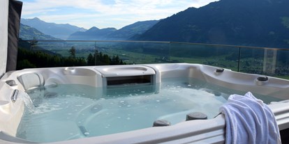 Hotels an der Piste - geführte Skitouren - Alpbach - Whirlpool auf der privaten Terrasse - Chalets & Apartments Wachterhof