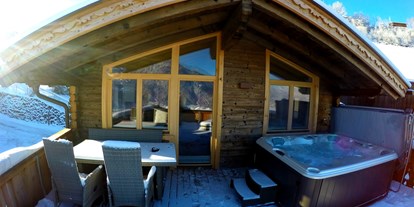 Hotels an der Piste - Suite mit offenem Kamin - Ski-Optimal Hochzillertal Kaltenbach - Comfort Chalet Mühle - Chalets & Apartments Wachterhof