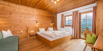 Hotels an der Piste - Sauna - Gosau - Hüttenzimmer Wilderer - Almwelt Austria