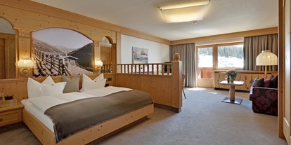 Hotels an der Piste - Suite mit offenem Kamin - Finkenberg - Zimmer - ****Hotel Almhof