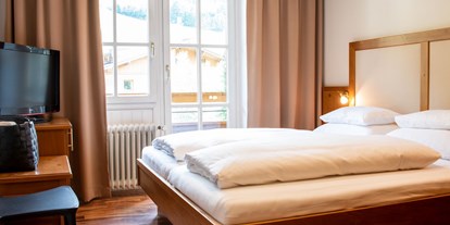 Hotels an der Piste - Skiraum: Skispinde - Mittersill - Schlafzimmer - The RESI Apartments "mit Mehrwert"