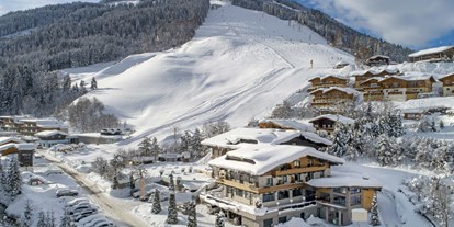 Hotels an der Piste - Pools: Außenpool beheizt - Leogang - Alps Resorts Saalbach Suites