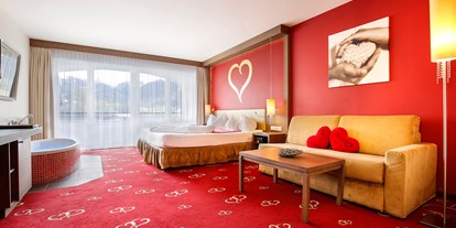 Hotels an der Piste - Suite mit offenem Kamin - Themen-Zimmer Herz - Heart Room - Romantik & Spa Alpen-Herz