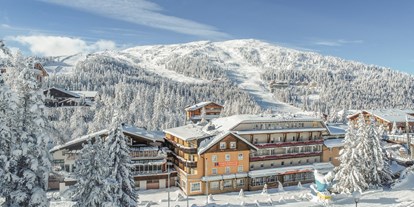 Hotels an der Piste - barrierefrei - Katschberghöhe - Außenansicht im Winter - Familienhotel Hinteregger