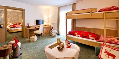 Hotels an der Piste - Hallenbad - Kärnten - Zimmer - Familienhotel Hinteregger