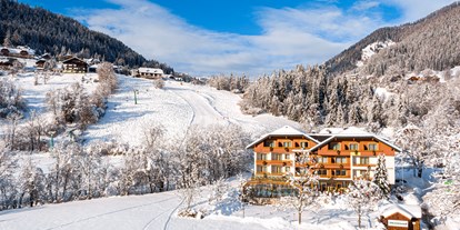 Hotels an der Piste - Preisniveau: gehoben - Skigebiet Bad Kleinkirchheim - Hotel Almrausch - an der Sonnwiesenabfahrt (Verbindung zu den Skiliften in St.Oswald und Skiliften in Bad Kleinkirchheim) - Genusshotel Almrausch