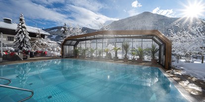 Hotels an der Piste - Pools: Außenpool beheizt - Skigebiet Bad Kleinkirchheim - Beheizter & Überdachbarer Außenpool (Winter 31°C) - Genusshotel Almrausch