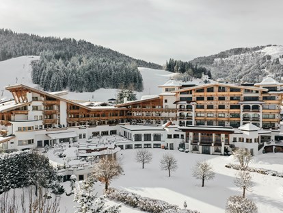 Hotels an der Piste - Ski-In Ski-Out - Außenansicht des Hotels - Sporthotel Ellmau
