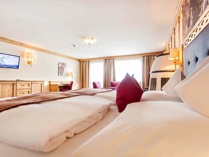 Hotels an der Piste - Verpflegung: Frühstück - Gemütliche Zimmer & Suiten - Skihotel Edelweiss Hochsölden