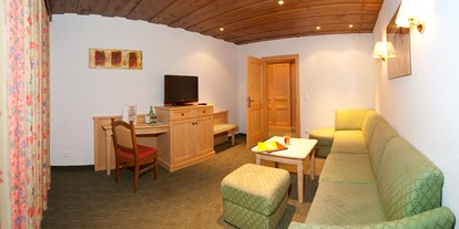 Hotels an der Piste - WLAN - Treffen (Treffen am Ossiacher See) - Wohnzimmer Suite "Nockberge" - Hotel Berghof