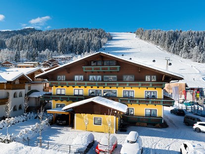 Hotels an der Piste - Hotel-Schwerpunkt: Skifahren & Familie - B&B Hotel Die Bergquelle - Ihr Hotel direkt an der Skipiste beim Achterjet in Flachau - B&B Hotel Die Bergquelle