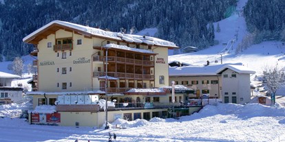 Hotels an der Piste - Ski-In Ski-Out - Tirol - Hotel Austria mit Gondelbahn,
Übungswiese und Langlaufloipe - Hotel Austria