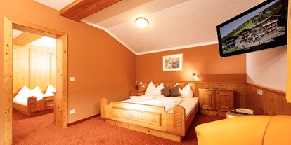 Hotels an der Piste - Parkplatz: gebührenpflichtig in Gehweite - Jochberg (Jochberg) - Suite 55 m² - Hotel Astrid