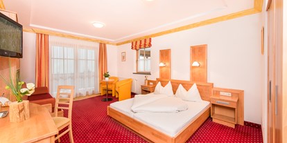 Hotels an der Piste - Parkplatz: gebührenpflichtig in Gehweite - Bramberg am Wildkogel - Juniorsuite 35 m² - Hotel Astrid