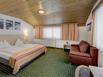 Hotels an der Piste - Parkplatz: kostenlos beim Hotel - Skiregion Hochkönig - Doppelzimmer Family - Hotel Bike & Snow Lederer