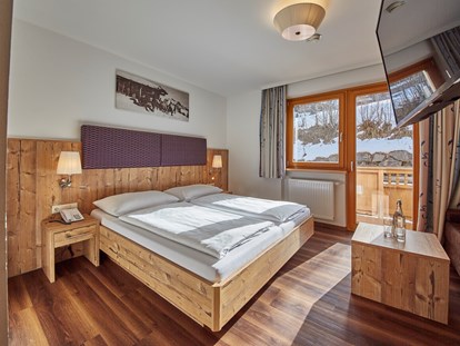 Hotels an der Piste - Wellnessbereich - Bramberg am Wildkogel - Doppelzimmer "Amethyst" - Dein MOUNTAIN Wohlfühlhotel Johanneshof
