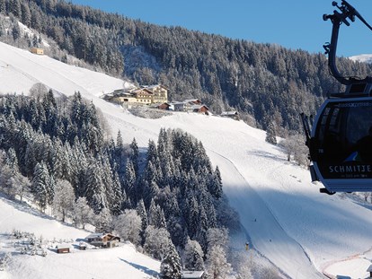 Hotels an der Piste - Skiraum: Skispinde - Mittersill - Direkt an der (roten) Piste
der Schmittenhöhe - Berghotel Jaga-Alm