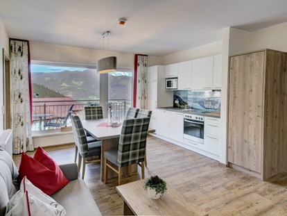 Hotels an der Piste - Skiraum: Skispinde - Hotelapartment Erlberg - Berghotel Jaga-Alm