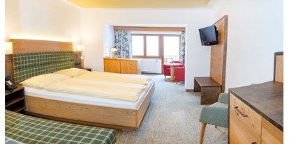 Hotels an der Piste - Skiraum: videoüberwacht - Itter - Komfortzimmer Deluxe - Landhotel Tirolerhof
