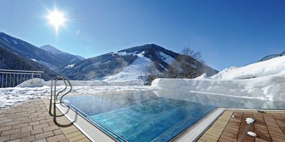 Hotels an der Piste - Preisniveau: moderat - Oberndorf in Tirol - Beheiztes Freibad 32 Grad - Der Eggerhof 