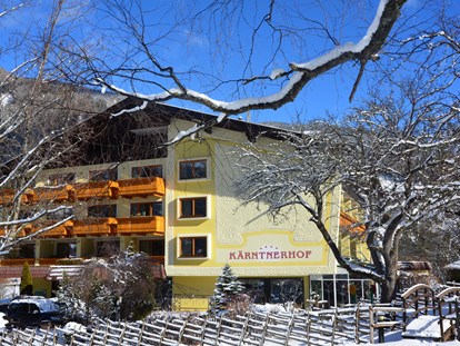 Hotels an der Piste - Skikurs direkt beim Hotel: für Erwachsene - Skigebiet Bad Kleinkirchheim - Kärntnerhof Winteransicht - Familien- & Sporthotel Kärntnerhof****