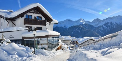 Hotels an der Piste - Wellnessbereich - Skigebiet Serfaus - Fiss - Ladis - Hotel Cores Fiss Außenansicht - Hotel Cores