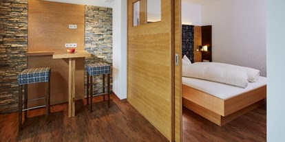 Hotels an der Piste - Hotel-Schwerpunkt: Skifahren & Wellness - Nauders - Hotel Cores Fiss Gartensuite - Hotel Cores