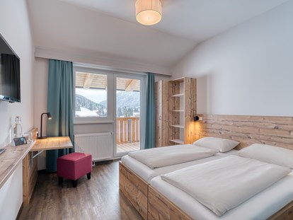 Hotels an der Piste - Sonnenterrasse - Standard Zimmer - COOEE alpin Hotel Bad Kleinkirchheim