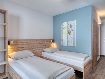 Hotels an der Piste - Hotel-Schwerpunkt: Skifahren & Familie - Kaiserburg Zimmer - COOEE alpin Hotel Bad Kleinkirchheim