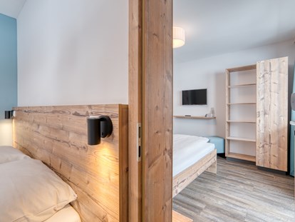 Hotels an der Piste - Skiraum: versperrbar - Kanzelhöhe - Familienzimmer - COOEE alpin Hotel Bad Kleinkirchheim