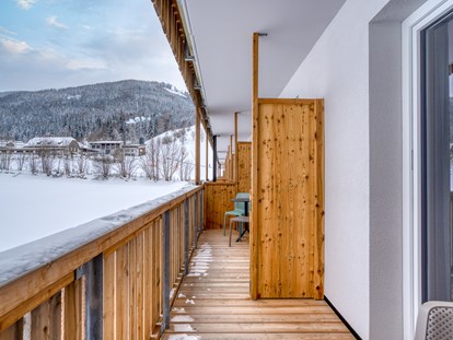 Hotels an der Piste - Skiraum: Skispinde - Kanzelhöhe - Familienzimmer - COOEE alpin Hotel Bad Kleinkirchheim