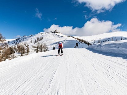 Hotels an der Piste - Skiraum: Skispinde - Kanzelhöhe - COOEE alpin Hotel Bad Kleinkirchheim