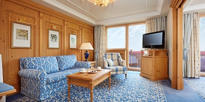 Hotels an der Piste - Suite mit offenem Kamin - Wohnen in der behaglichen Junior Suite in Lech - Romantik Hotel Die Krone von Lech