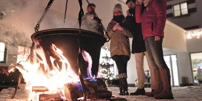 Hotels an der Piste - Skiservice: vorhanden - Salzburg - Begrüßung mit Glühwein und Kinderpunsch am Lagerfeuer - amiamo - Familotel Zell am See