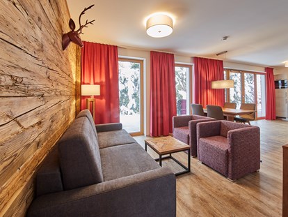 Hotels an der Piste - Pools: Außenpool beheizt - AlpenParks Hotel & Apartment Sonnleiten Saalbach