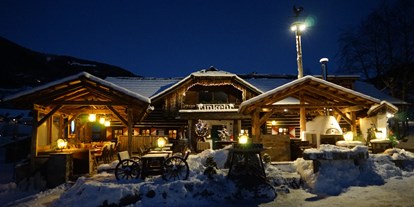Hotels an der Piste - Hotel-Schwerpunkt: Skifahren & Therme - Trattlers Einkehr direkt neben dem Chaletdorf - Trattlers Hof-Chalets