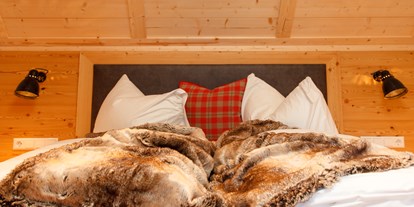 Hotels an der Piste - Ski-In Ski-Out - Kanzelhöhe - Schlafzimmer - Trattlers Hof-Chalets