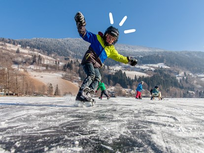 Hotels an der Piste - geführte Skitouren - Kärnten - Eislaufen am Brennsee - Hotel GUT Trattlerhof & Chalets****
