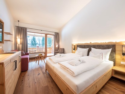 Hotels an der Piste - Pools: Innenpool - Gutshof Premium Zimmer - Hotel GUT Trattlerhof & Chalets****