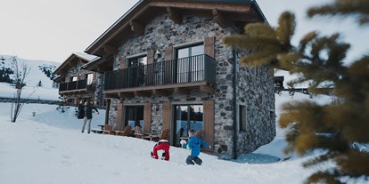 Hotels an der Piste - Kinder-/Übungshang - Skigebiet Katschberg - Großer, privater Garten für Spiel & Spaß im Schnee - KAUZ - Design Chalets