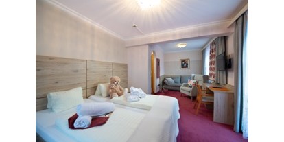Hotels an der Piste - Hotel-Schwerpunkt: Skifahren & Tourengehen - Wagrain - Komfort Zimmer mit gemütlicher
Sitzecke  - Hotel Vitaler Landauerhof****