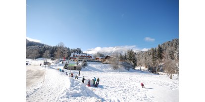 Hotels an der Piste - Bad Mitterndorf - Spielplatz  für Kinder im Winter
Rodeln - 1. Skilauf für Anfänger - Hotel Vitaler Landauerhof****