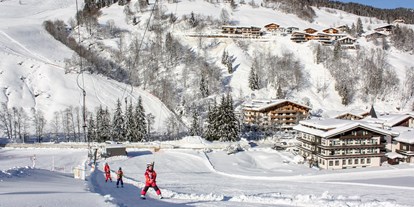 Hotels an der Piste - Skischulübungsgelände vis à vis vom Hotel - Erstklassig & down to Earth - das bio-zertifizierte Gartenhotel Theresia****S 