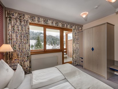 Hotels an der Piste - Rodeln - Elternschlafzimmer in der Familien-Luxussuite "Max & Moritz" - Hotel St. Oswald